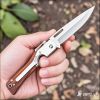 CampingGearGoals Portable Tactical Knife with Quick-Deploy Feature - stainless steel