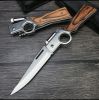 CampingGearGoals Portable Tactical Knife with Quick-Deploy Feature - stainless steel